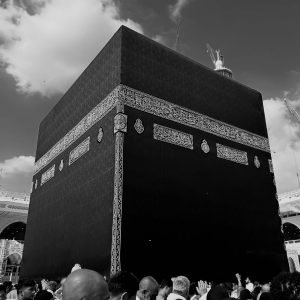Crowd of pilgrims around the Kaaba during daytime in Mecca, Saudi Arabia.